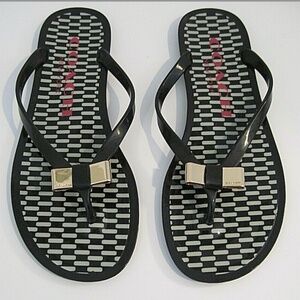 Women's Coach Landon Black Jelly Thong Flip Flop Sandals with Gold Bow, size 8.5